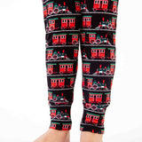 Legs showing train print detail on pajamas. 